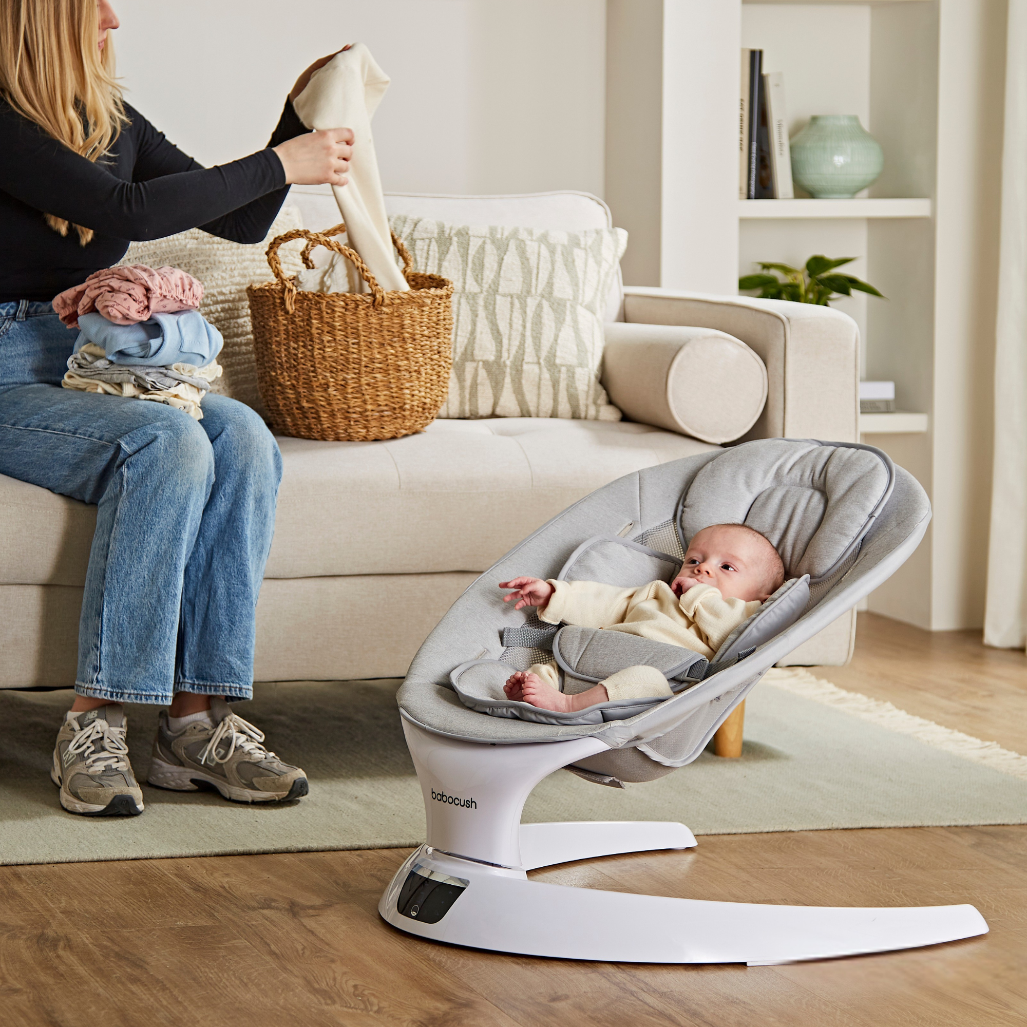 Happy baby in the Babocush Baby Swing & Rocker