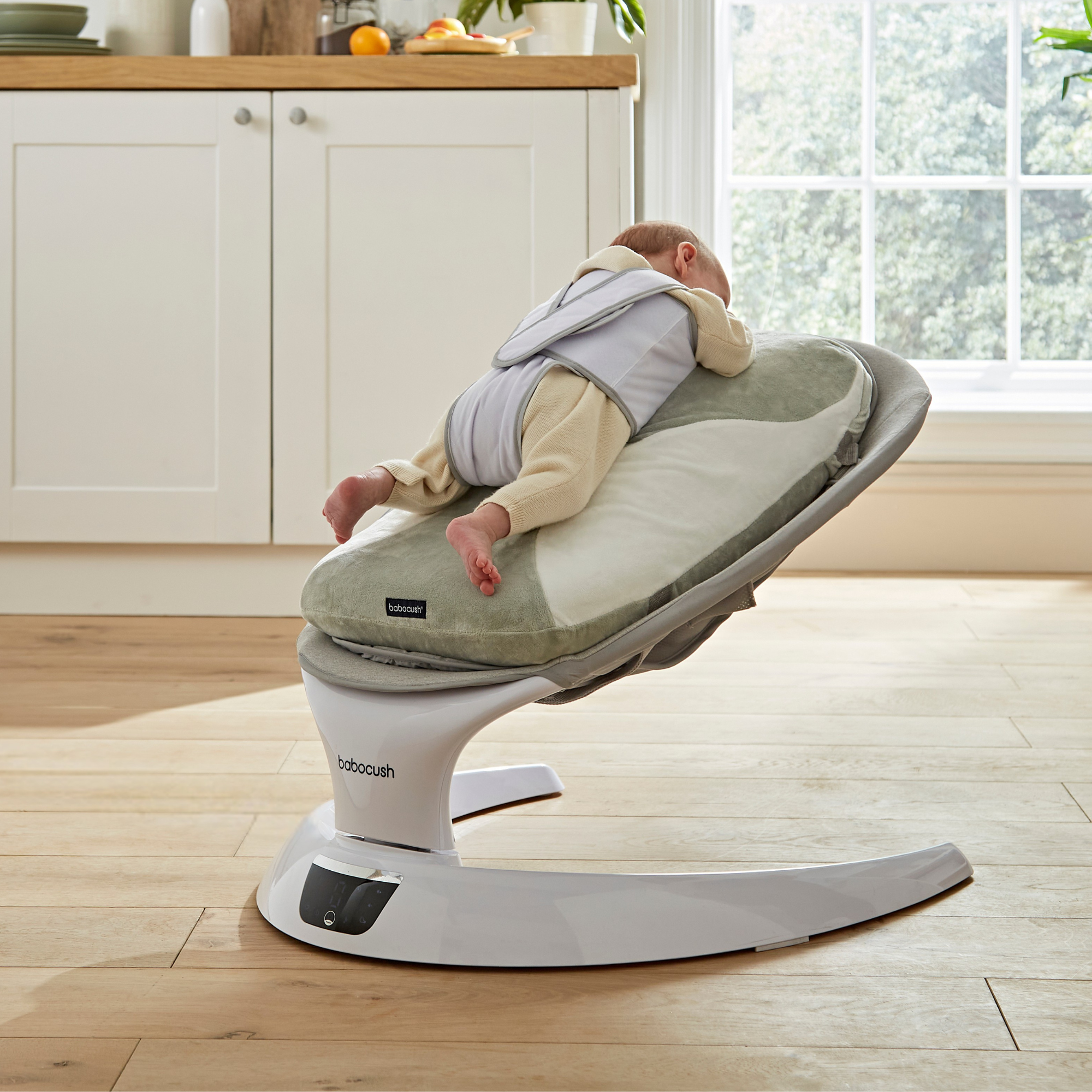 Content baby on the Babocush Rocker and Cushion Combo