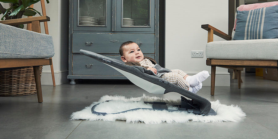 Infant sitting on Babocush baby bouncer