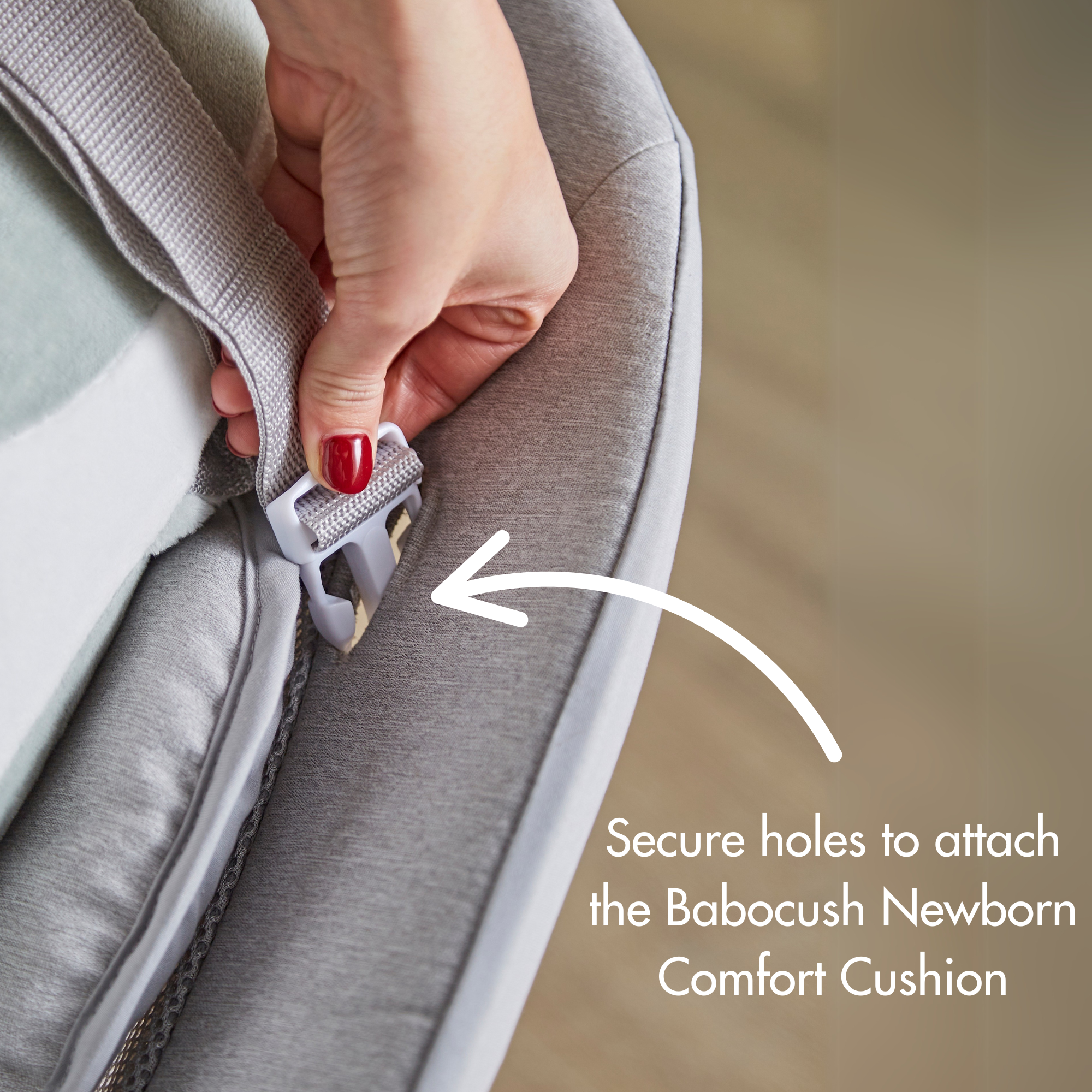 Secure holes to attach the Babocush Newborn Comfort Cushion